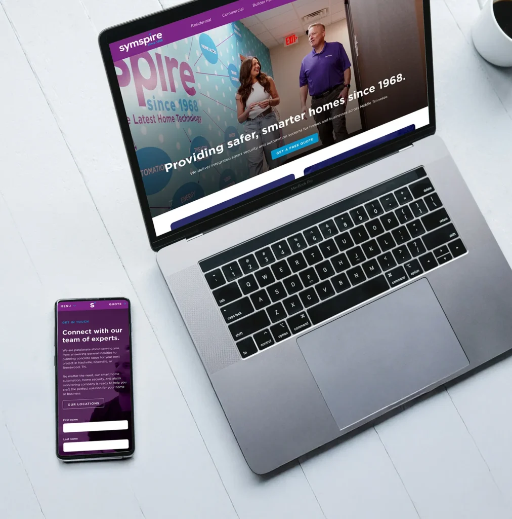Laptop and phone showing the Symspire website